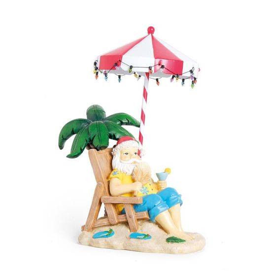 Noel Sentado na Praia com Coqueiro Colorido